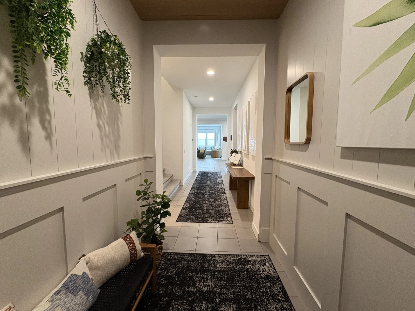 Custom paneled accent wall in a residential entryway