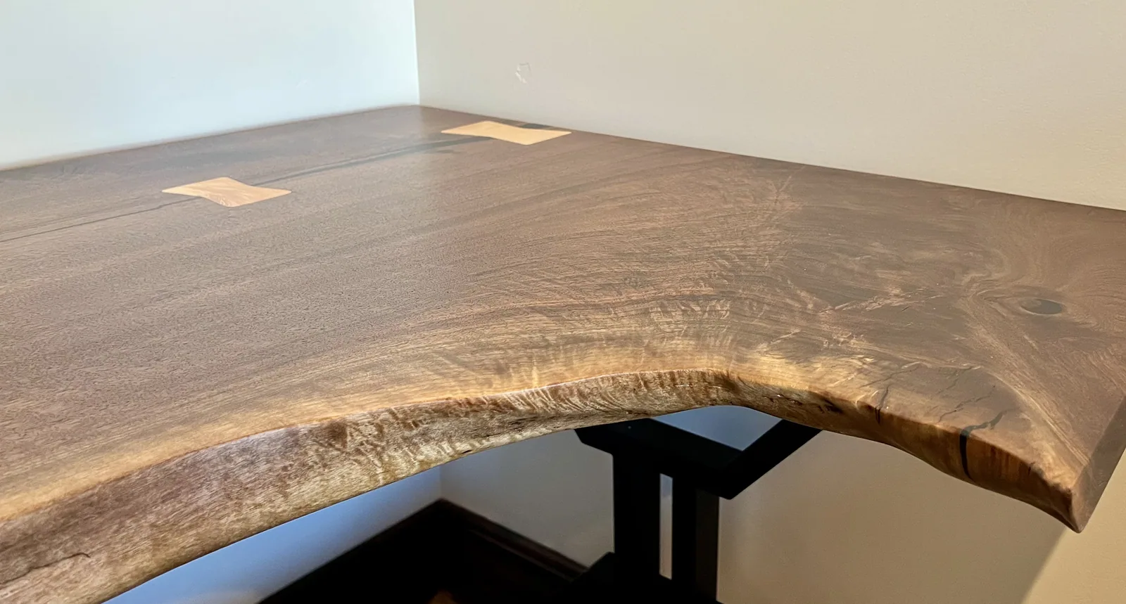 Close view of the live edge and corner joinery