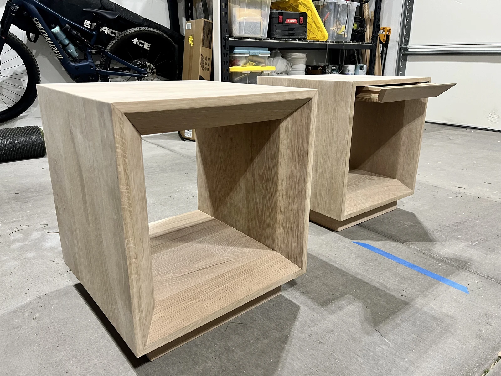 Pair of square end tables during construction in the shop